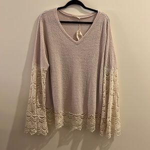 Waffle knit top with lace sleeves